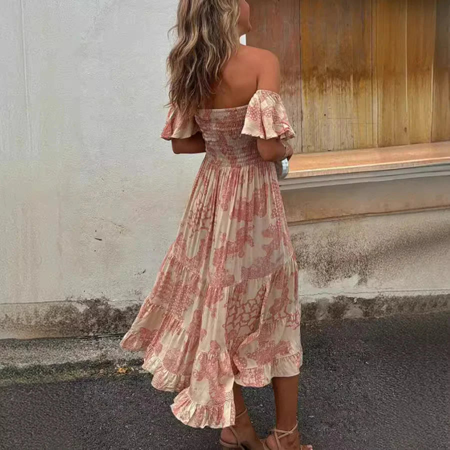 Tilda - Elegant volangklänning med off-shoulder design